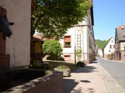 Ortsansicht Schonderfeld mit Dorfbrunnen